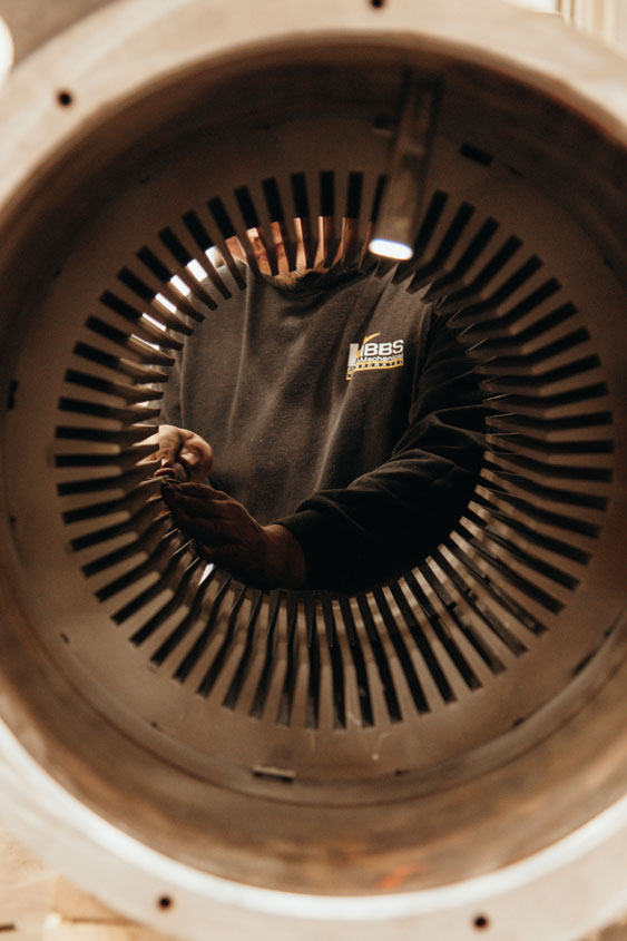Image of Hibbs team member from inside a motor being installed